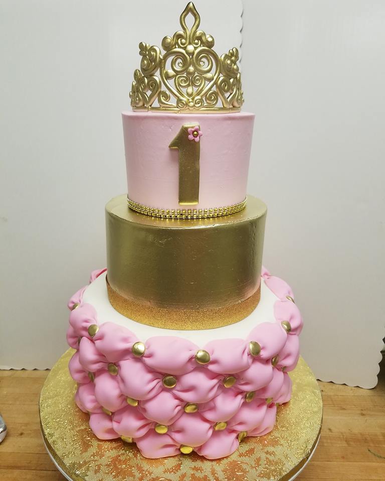 gold and pink tier cake